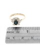 Blue Sapphire and Diamond Halo Ring in Yellow Gold